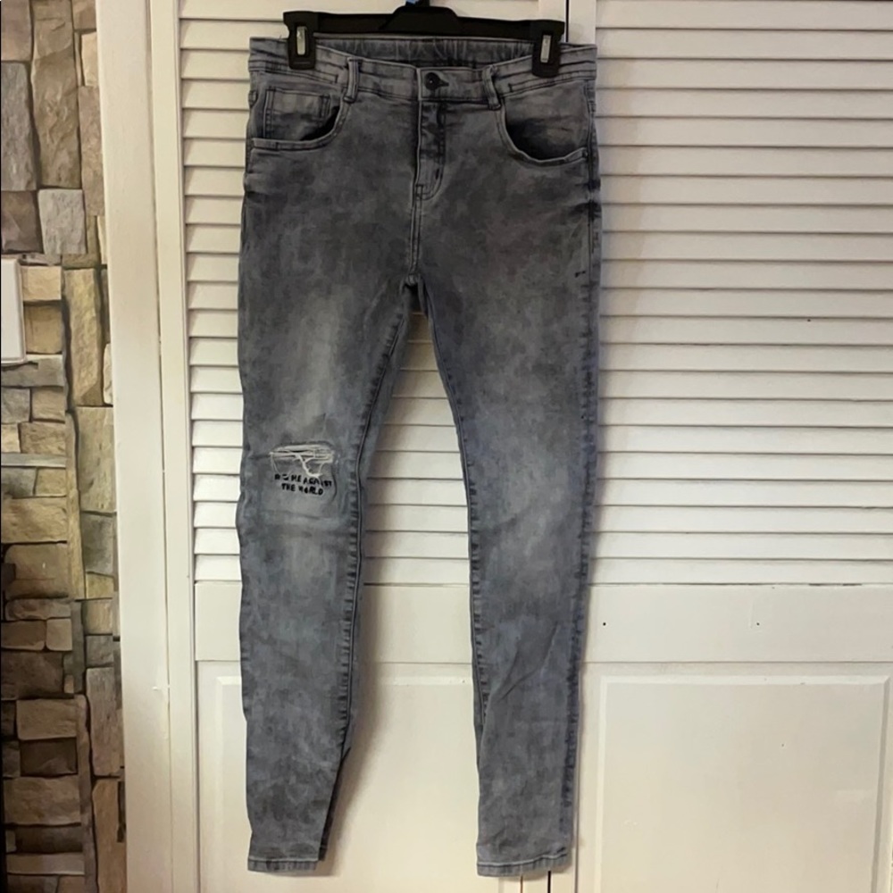 Young teen boy jeans